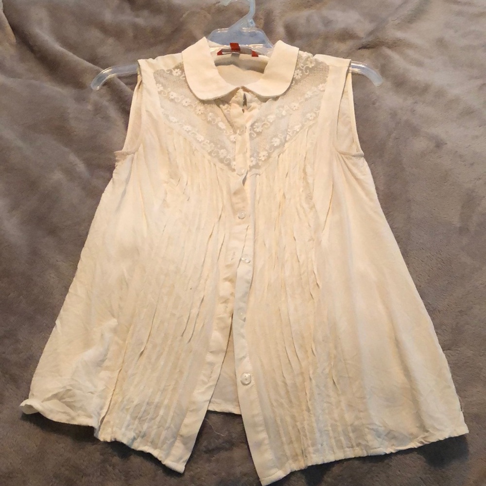 Ivory button-up sleeveless blouse